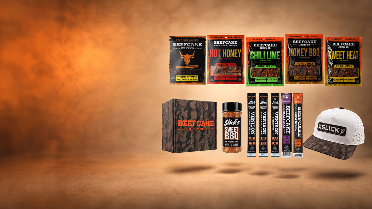 Slick x Beefcake bundle with jerky, meat sticks, Sweet BBQ seasoning, a Slick hat, and a camo box.