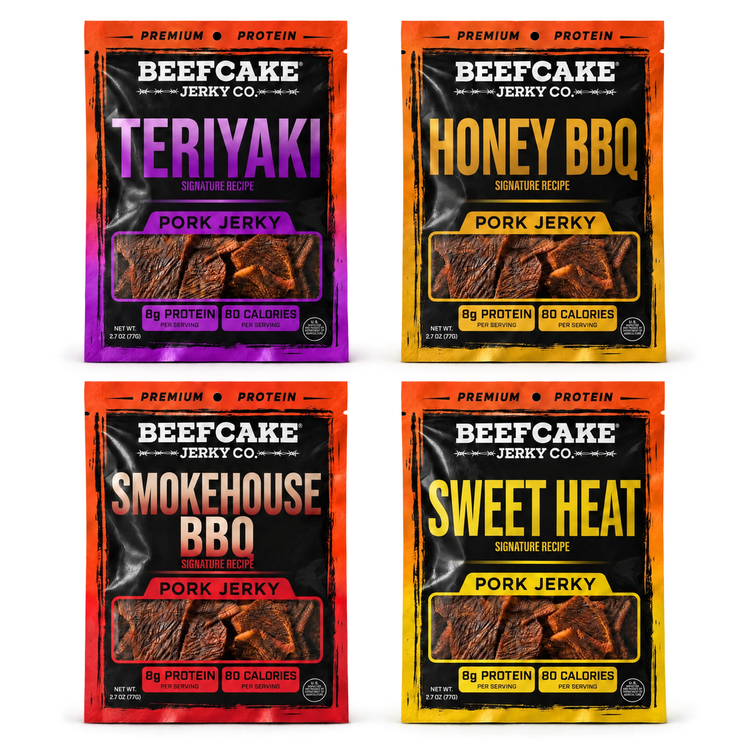 Four BeefCake pork jerky bags: Teriyaki, Honey BBQ, Smokehouse BBQ, and Sweet Heat, with soft shadows on a transparent background.